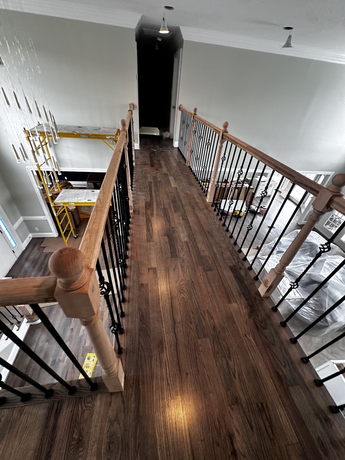 Before: bridge walkway with new hardwood and balusters, scaffolding still up