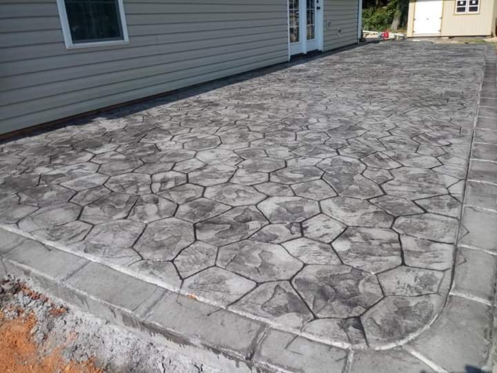 Finished: gray flagstone-pattern stamped concrete patio and walkway